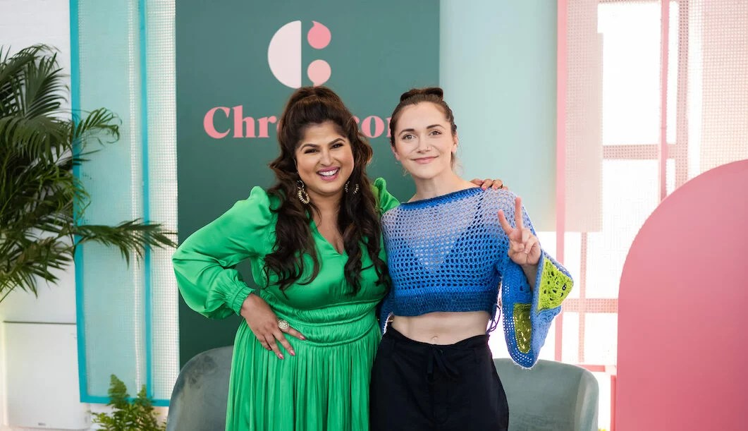 Nitika Chopra (left) and Alyson Stoner standing together at Chronicon on May 19, 2023, in New York City.