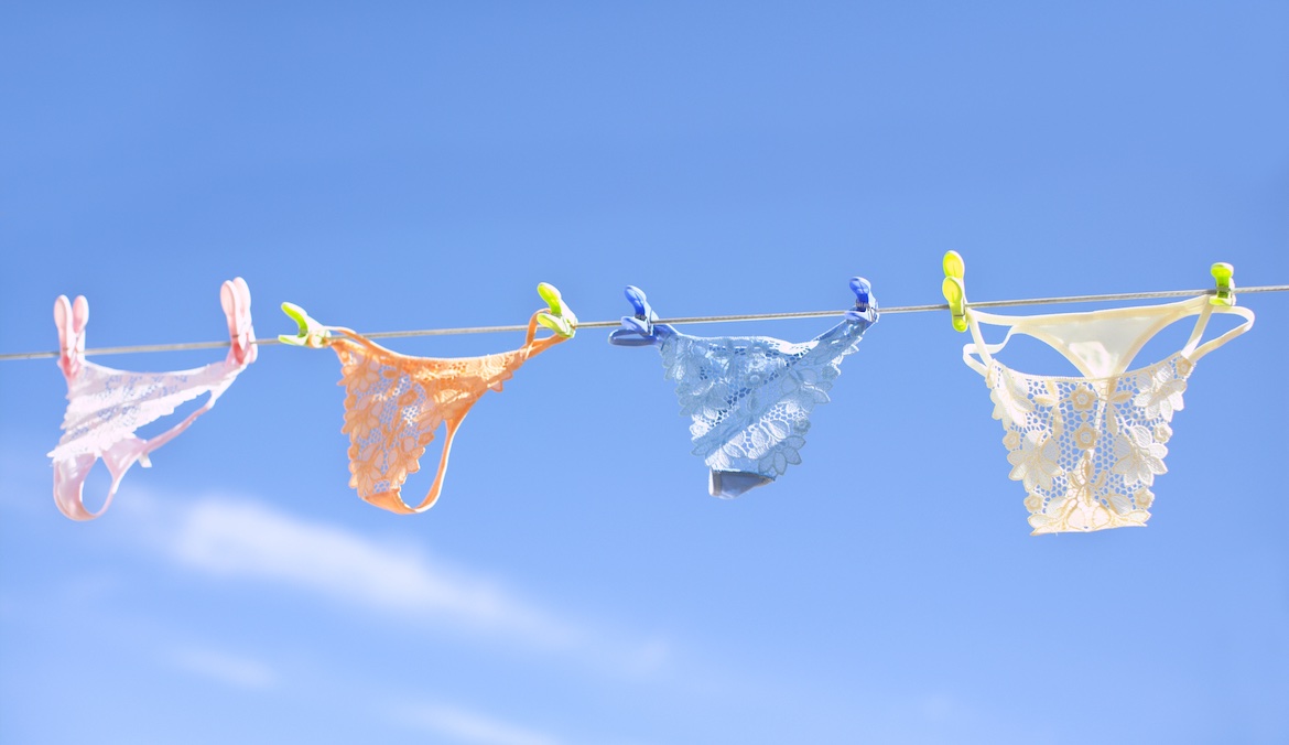 lace women's underwear hanging from a laundry line