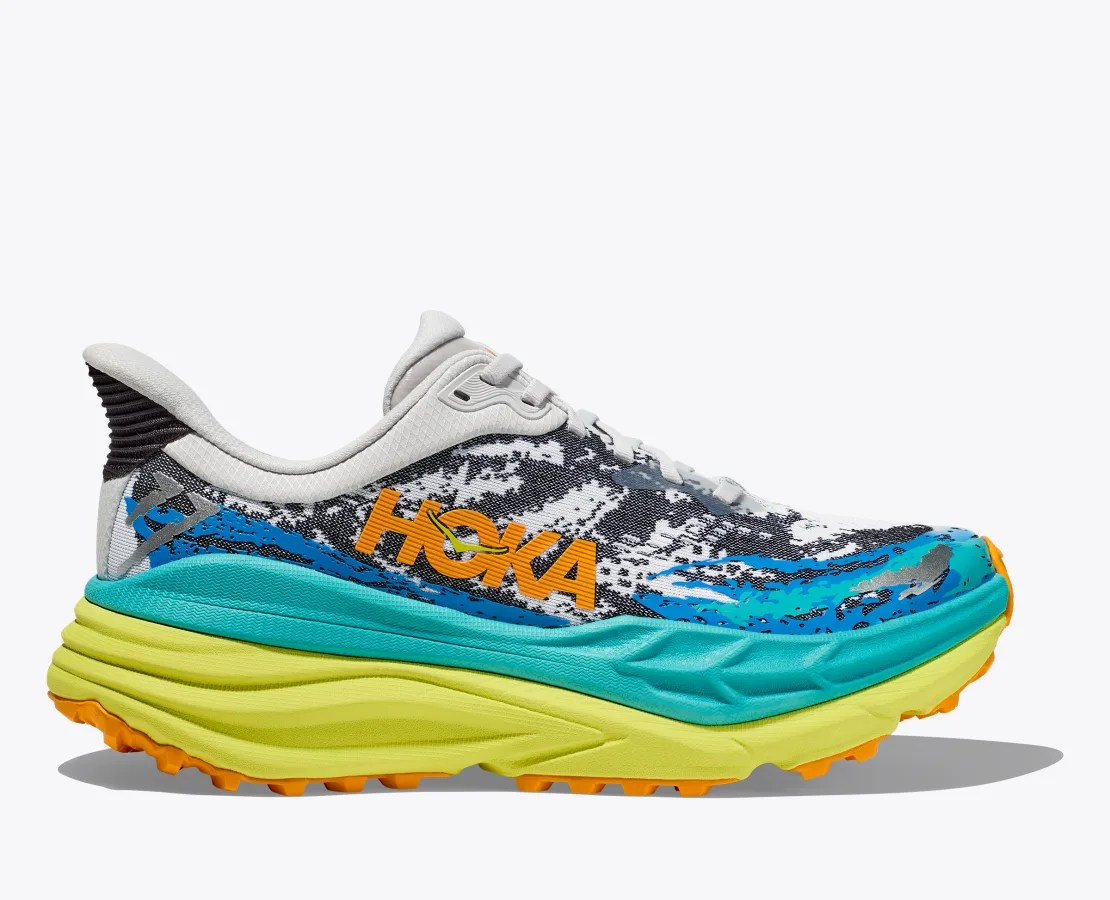 hoka stinson 7 sneaker with yellow and teal sole