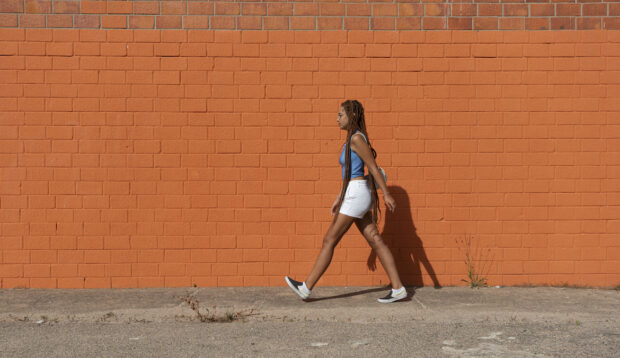 8 Ways To Make Walking in the Heat More Bearable, According to a Walking Coach