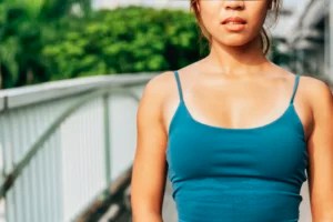 Turns Out, Boob Sweat Can Give You Yeast Infections—Here's How Dermatologists Want You To Deal