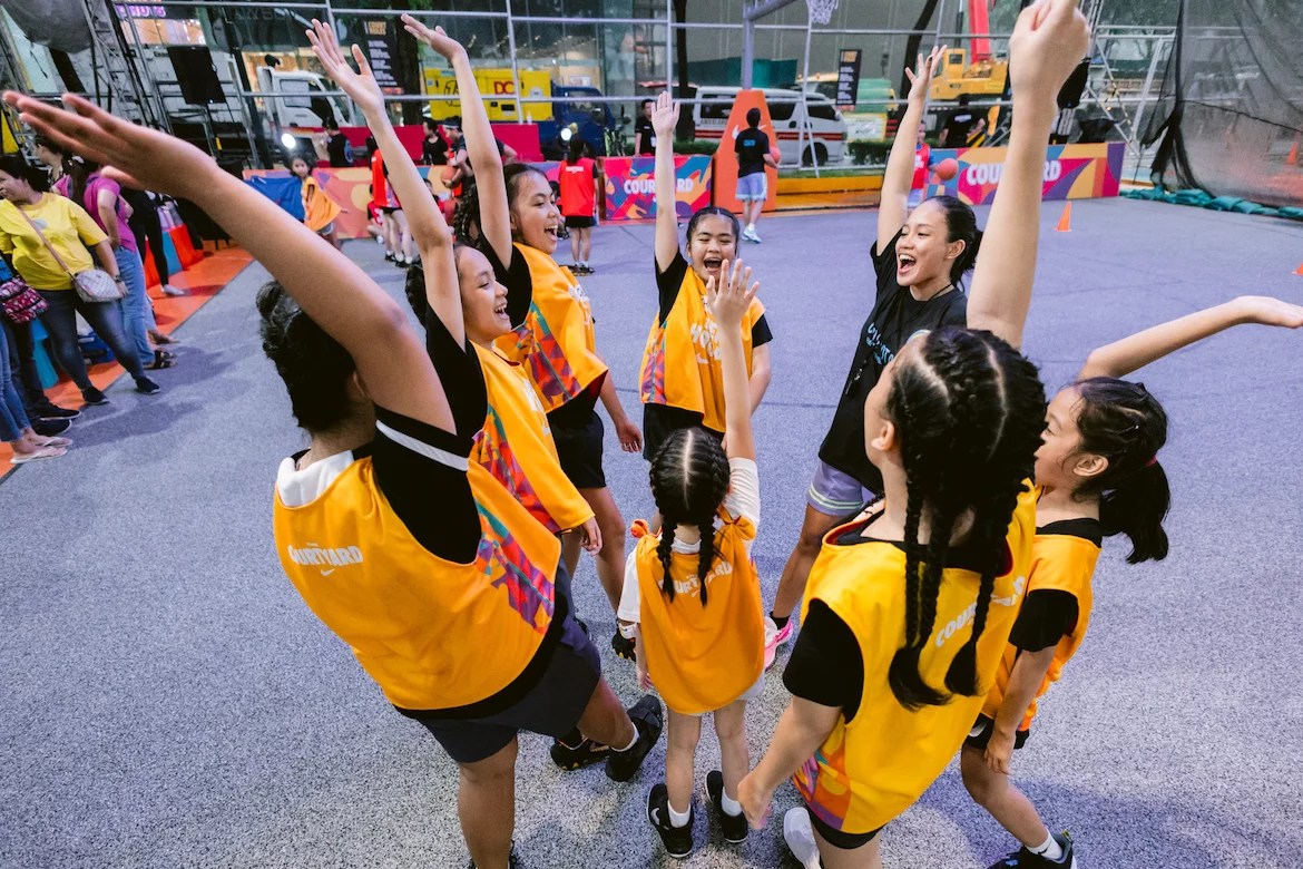 Girls cheering at a Nike coaching girls event in Manila