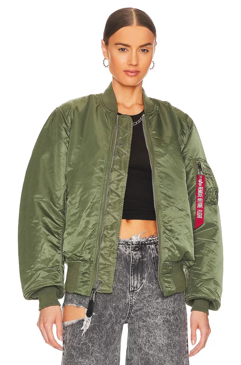 woman wearing alpha industries ma-1 blood chit bomber jacket
