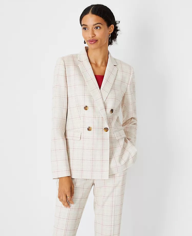 woman wearing tailored double breasted blazer in plaid