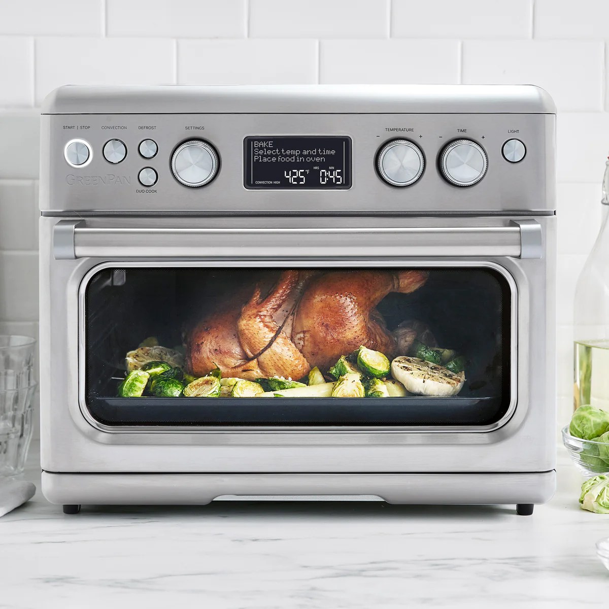A chicken roasting in the greenpan premier convection air fry oven