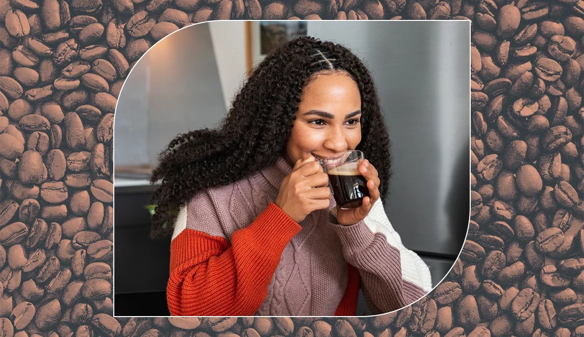 woman enjoys a cup of coffee made with her mini Keurig