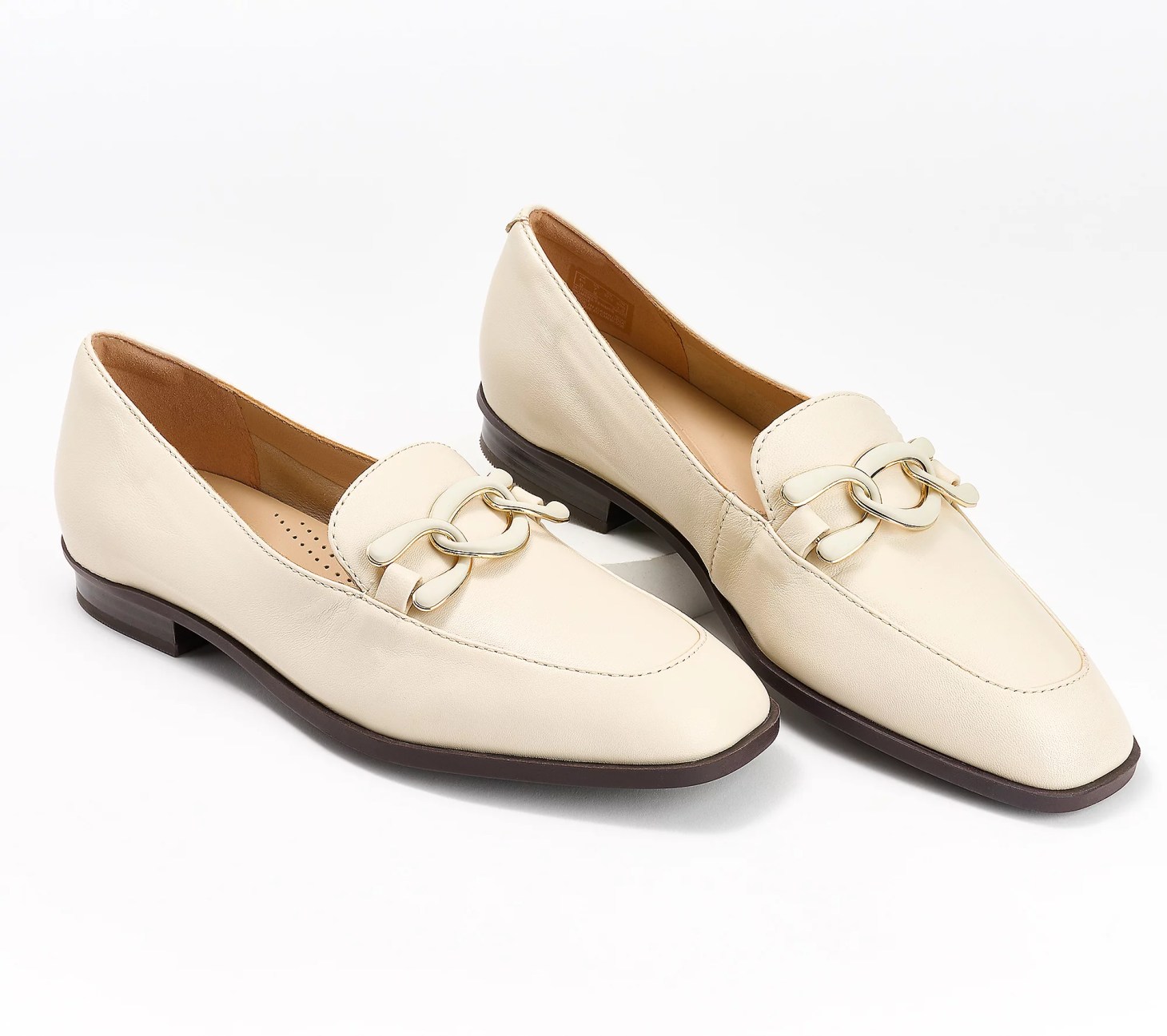 a white pair of sarafyna rae clarks on sale