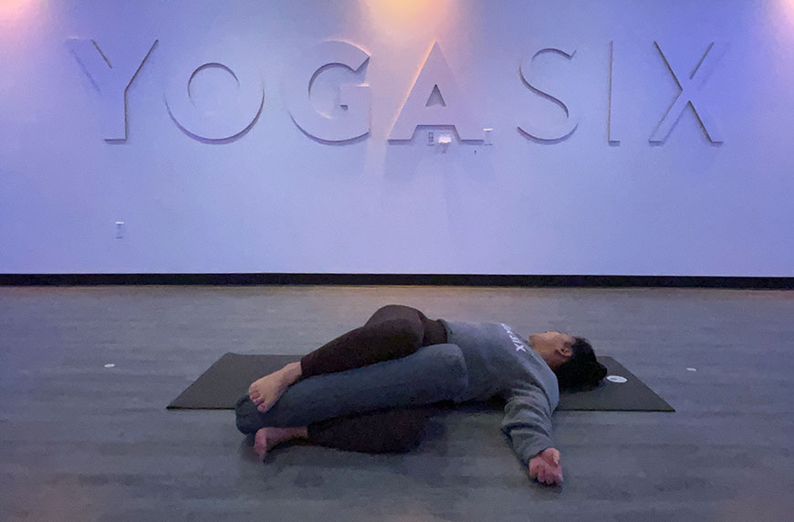 restorative yoga poses supported reclining twist pose