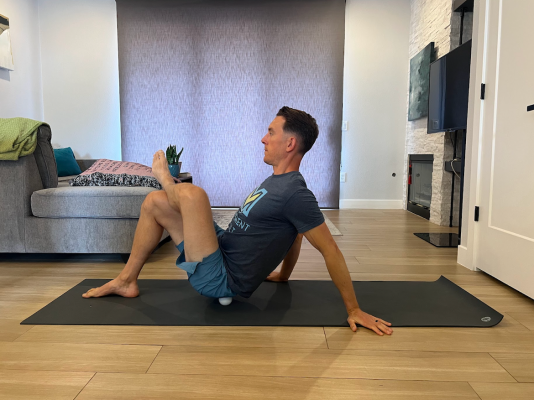 Physical therapist demonstrating gluteus muscle and fascia release