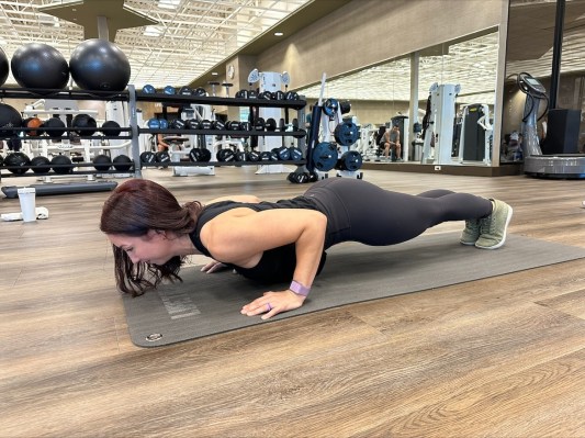 Personal trainer demonstrating push-up